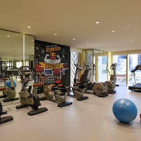 Voco Doha West Bay Suites By Ihg Exterior photo The gym at the hotel