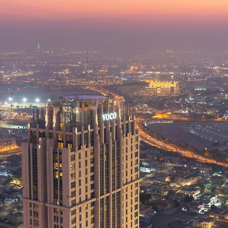 Voco Doha West Bay Suites By Ihg Exterior photo The 101 building at night