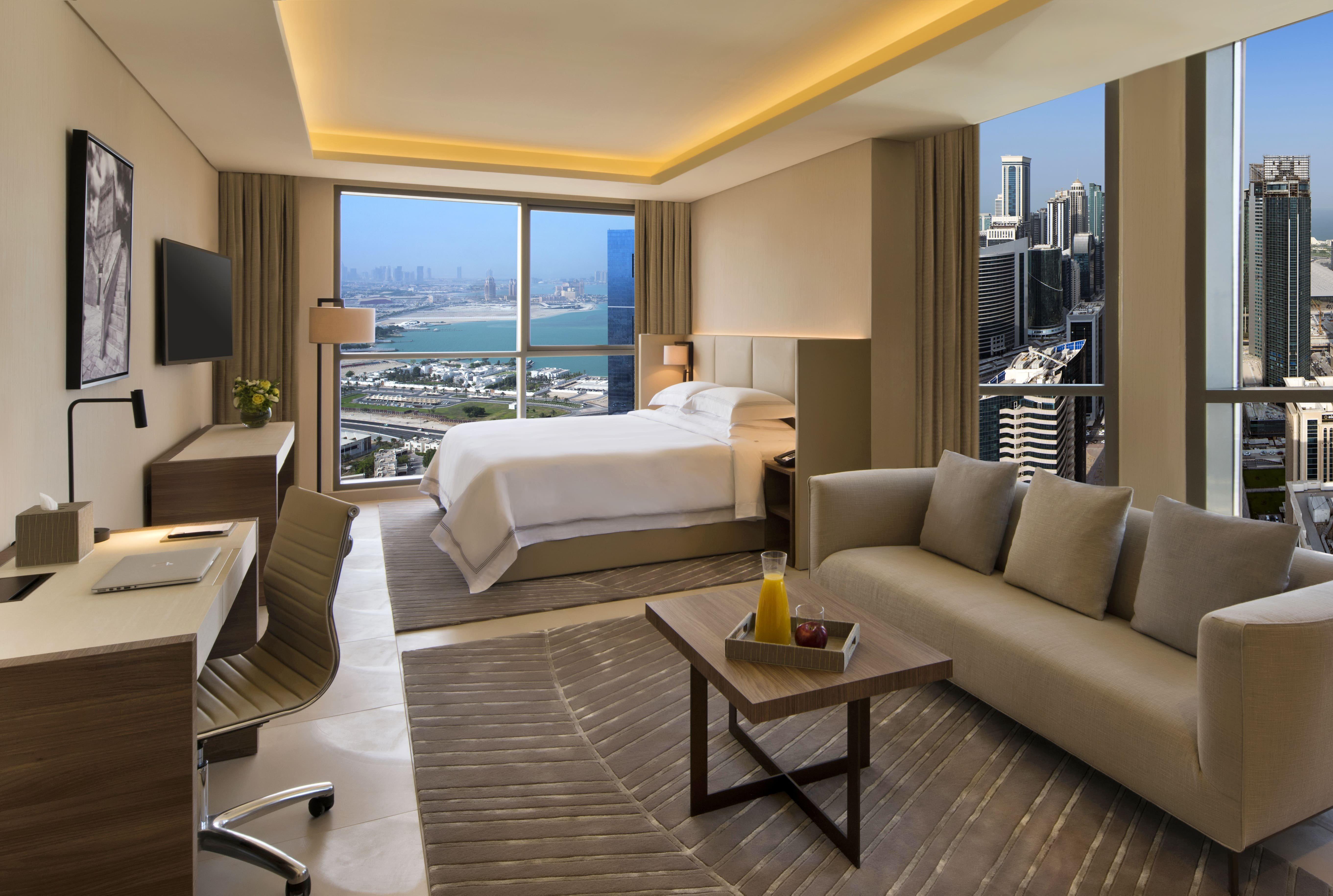 Voco Doha West Bay Suites By Ihg Exterior photo A guest room at the hotel
