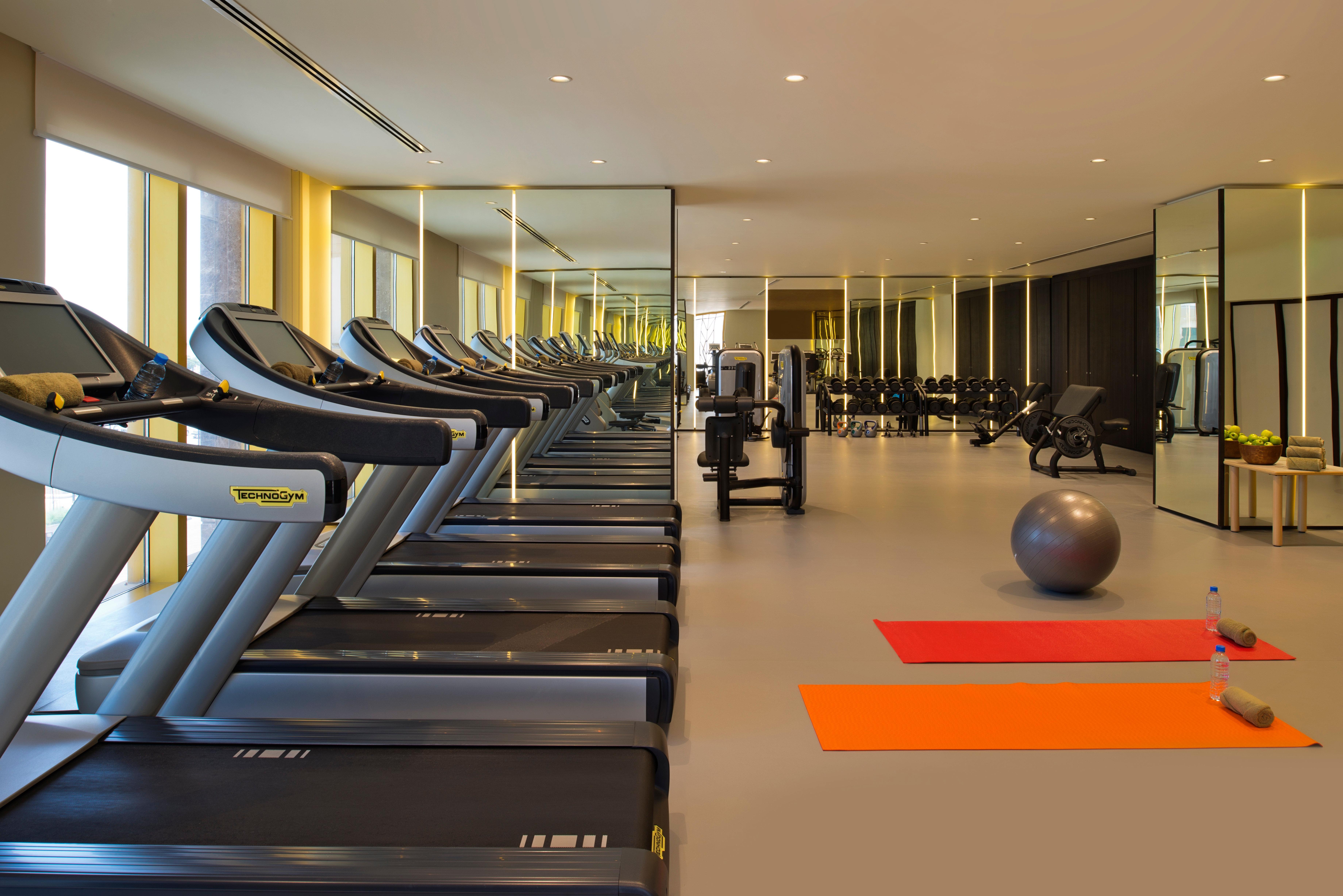 Voco Doha West Bay Suites By Ihg Exterior photo The gym at the hotel