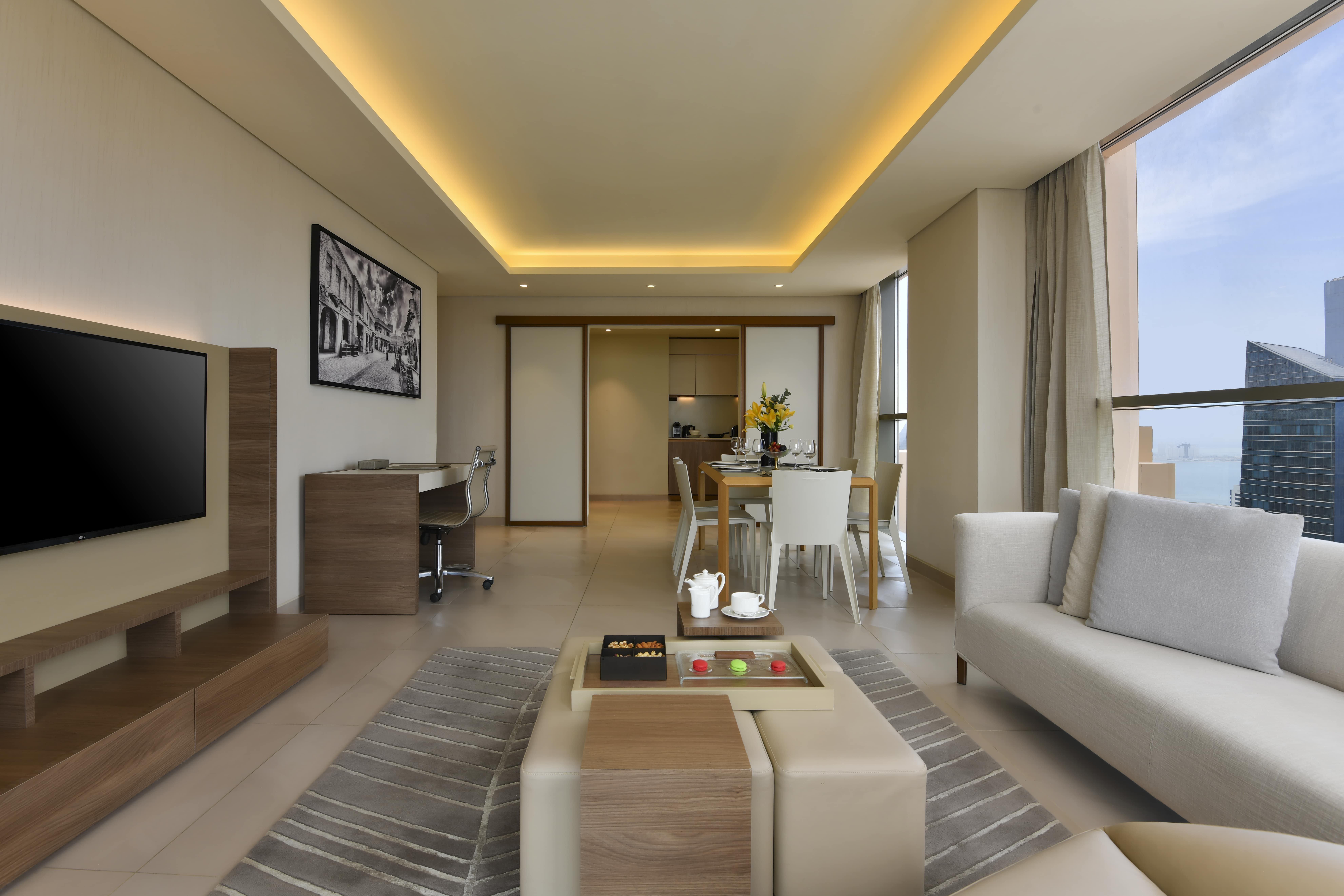 Voco Doha West Bay Suites By Ihg Exterior photo A typical apartment interior