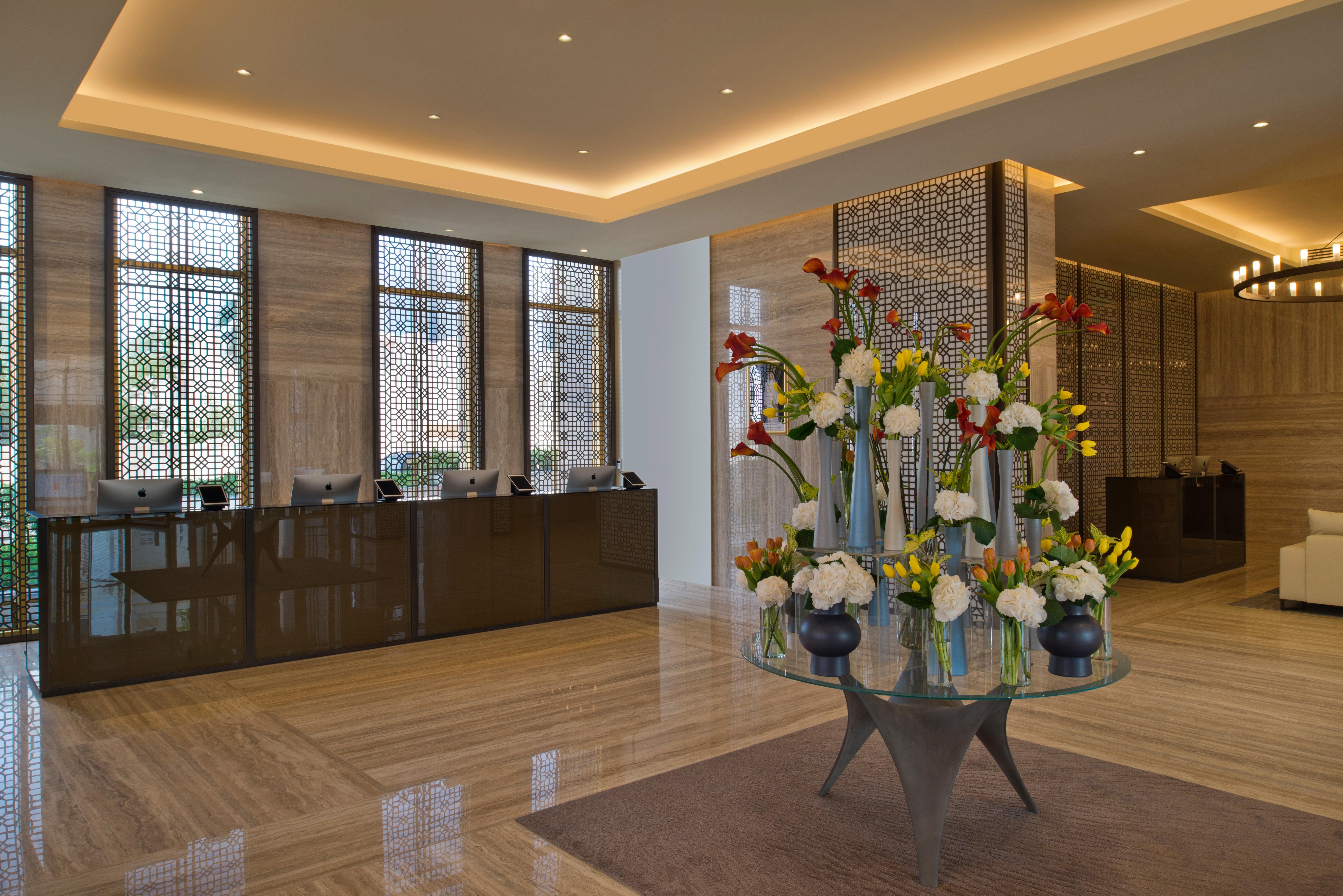 Voco Doha West Bay Suites By Ihg Exterior photo The lobby of the hotel