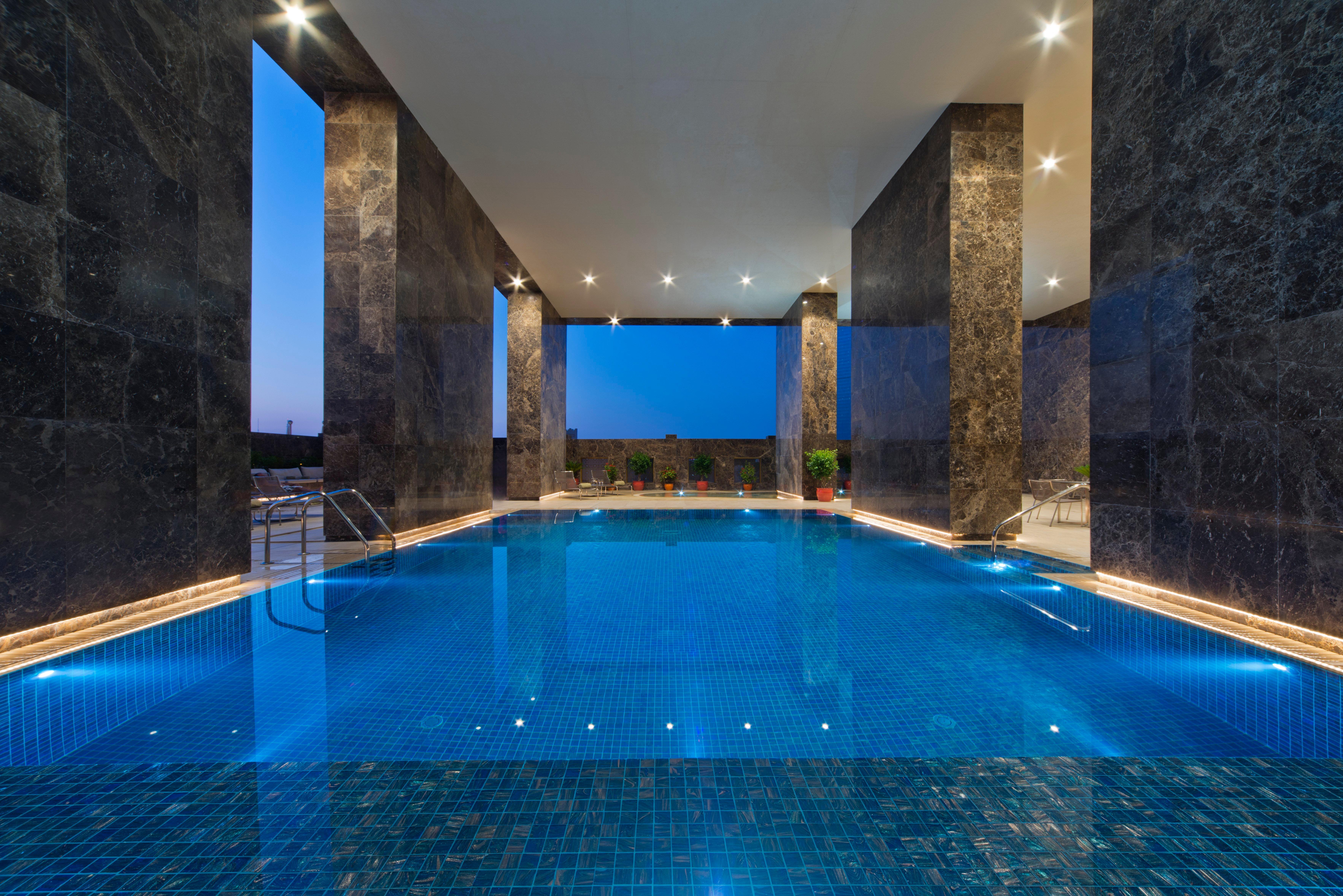 Voco Doha West Bay Suites By Ihg Exterior photo Indoor pool