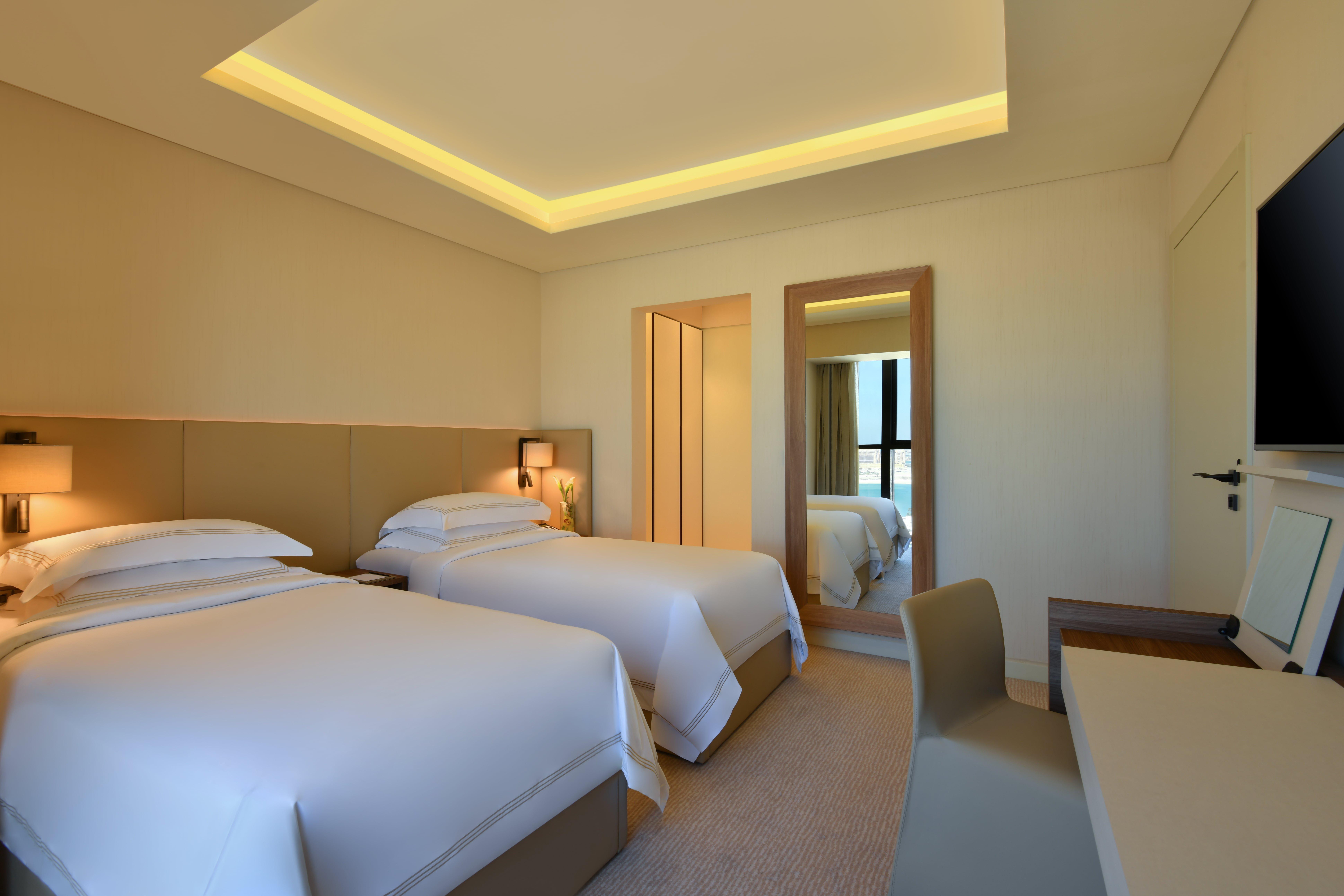 Voco Doha West Bay Suites By Ihg Exterior photo Deluxe room