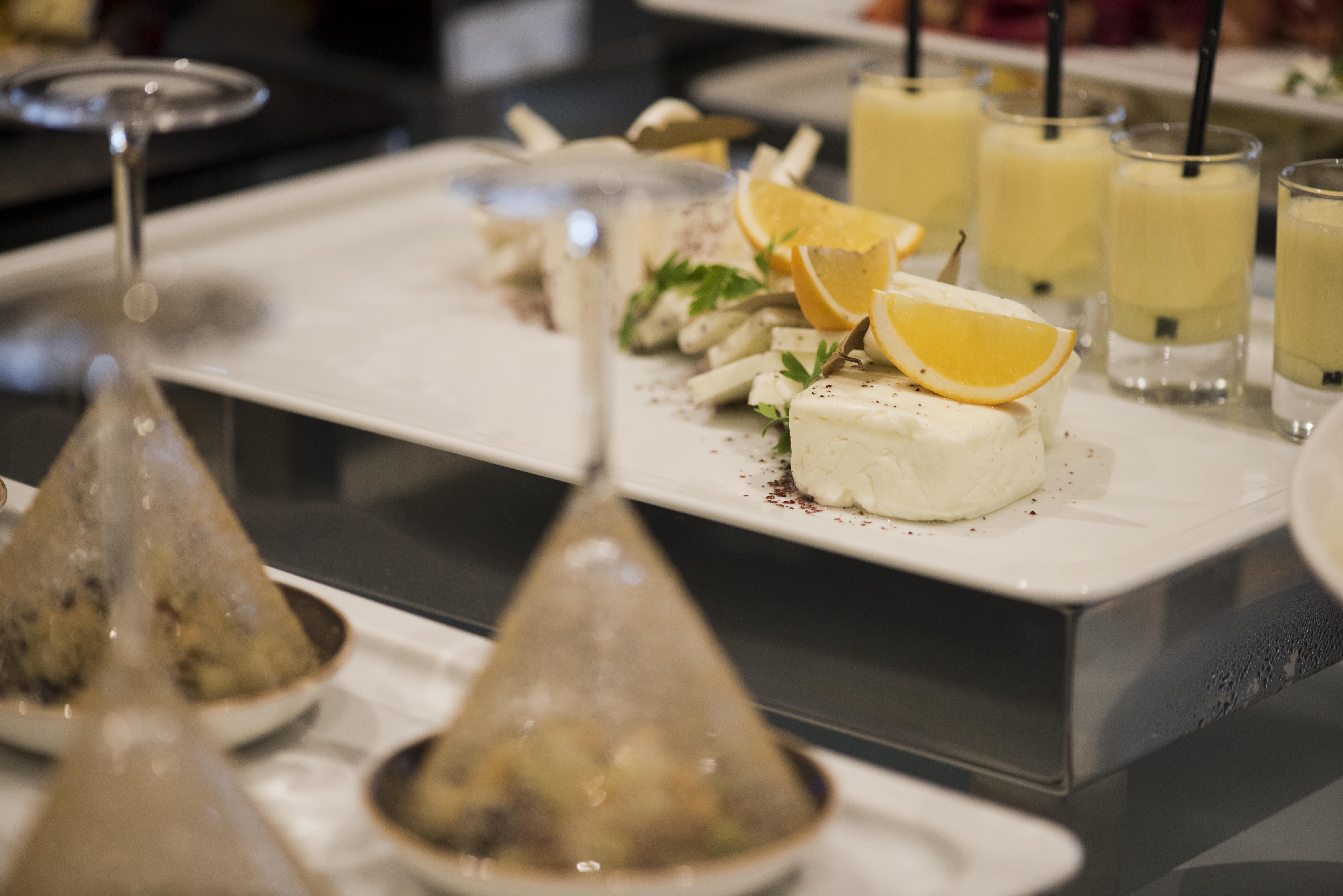 Voco Doha West Bay Suites By Ihg Exterior photo A selection of cheese and lemon