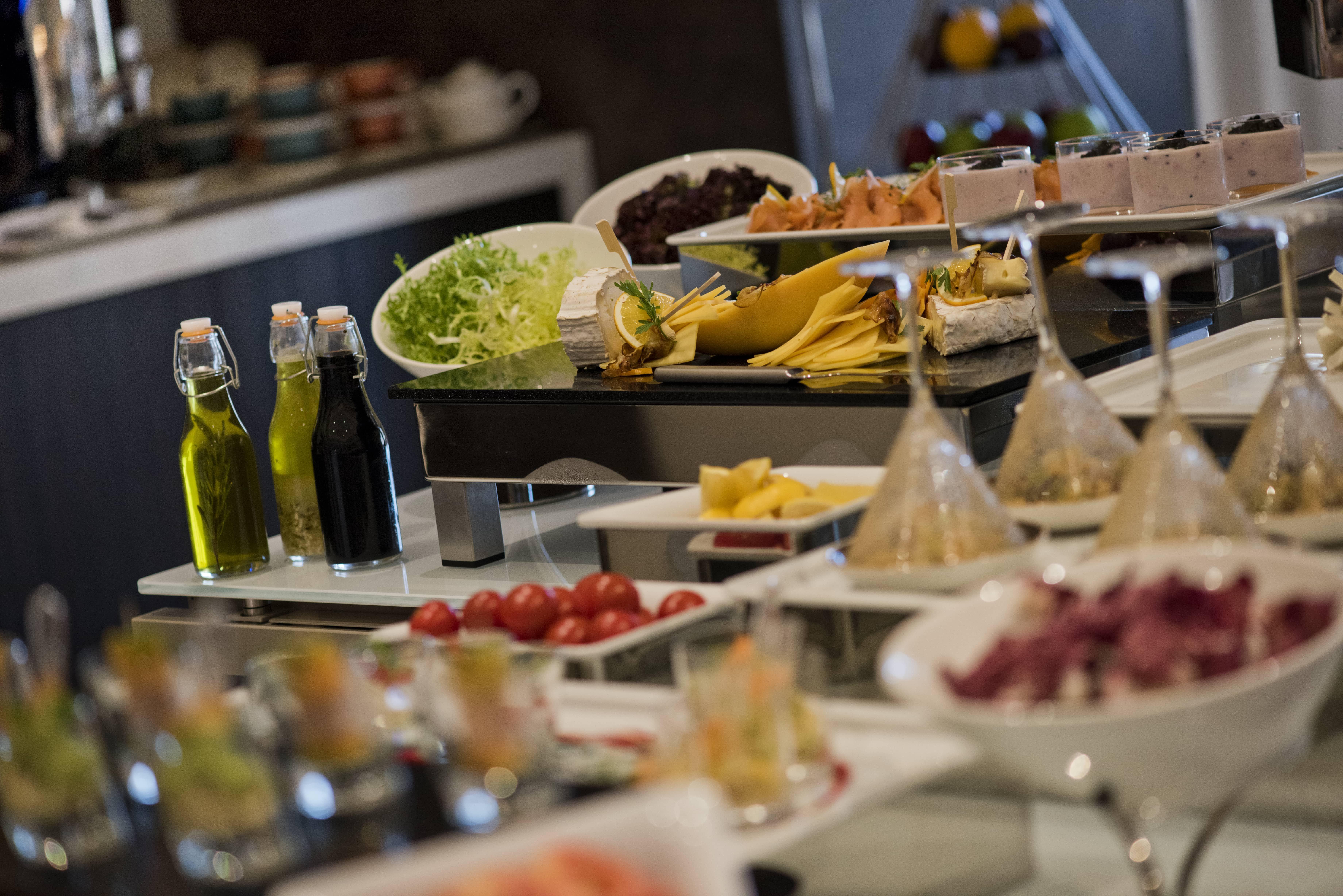 Voco Doha West Bay Suites By Ihg Exterior photo A salad bar