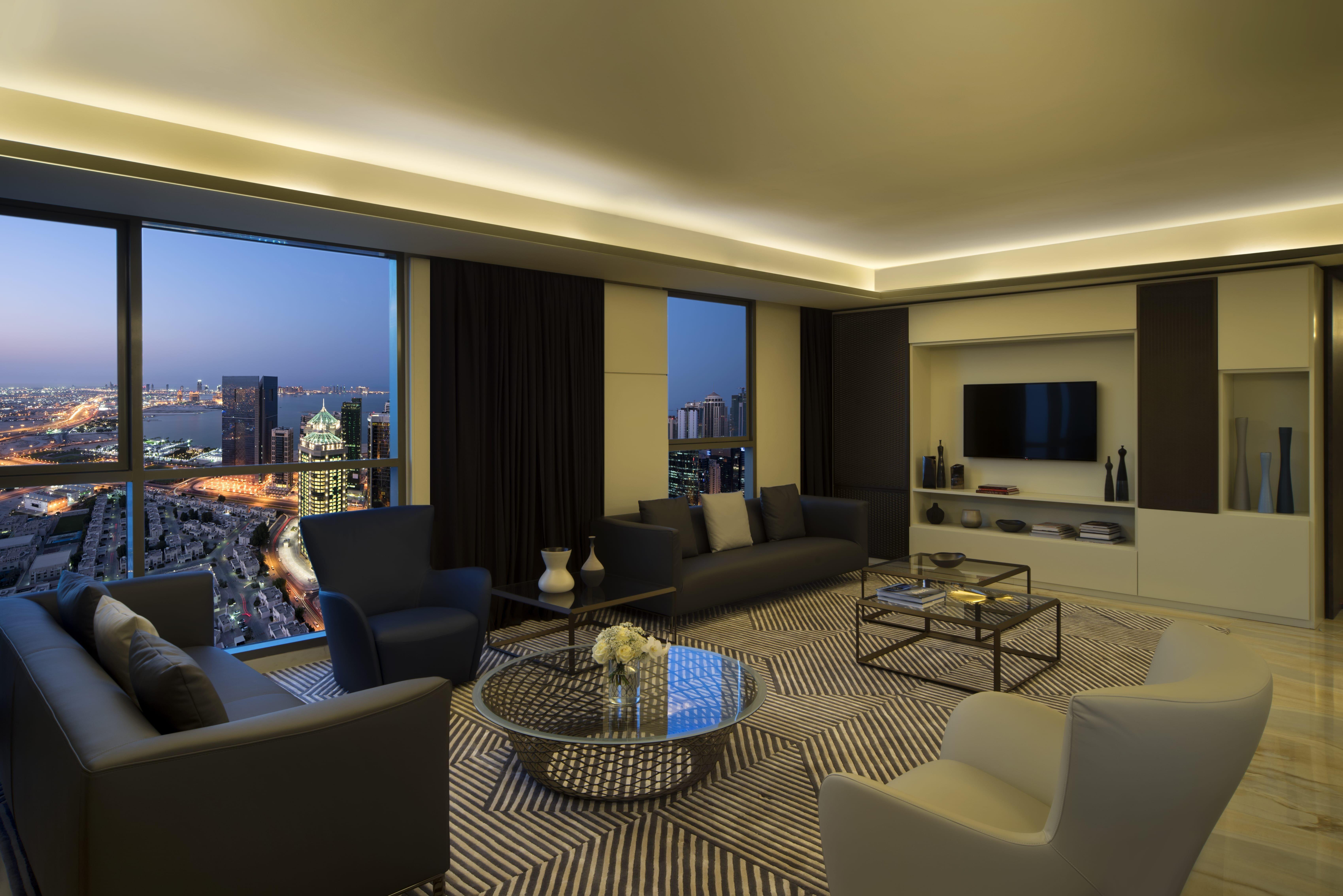 Voco Doha West Bay Suites By Ihg Exterior photo A living room in a typical apartment
