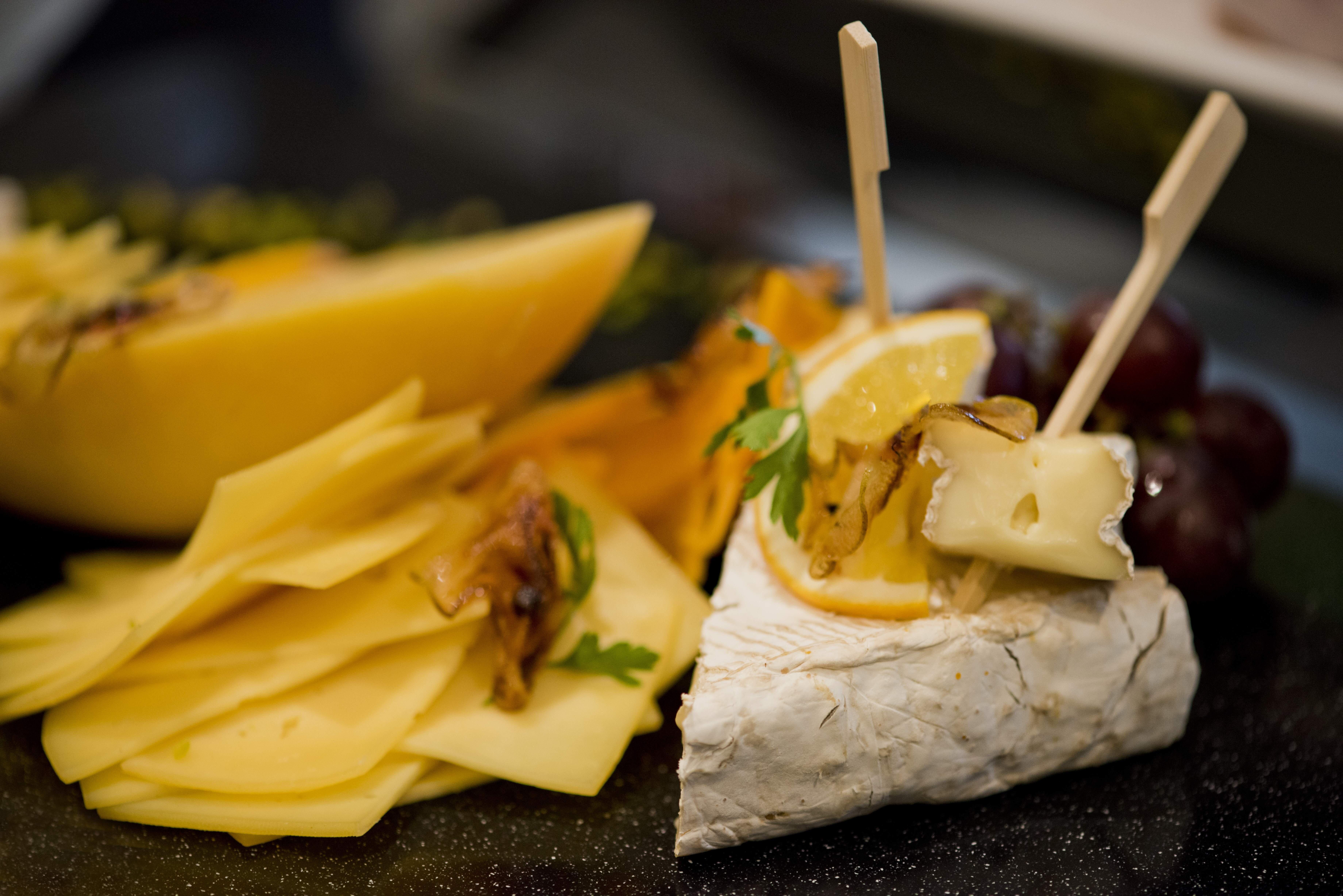 Voco Doha West Bay Suites By Ihg Exterior photo Cheese and fruit