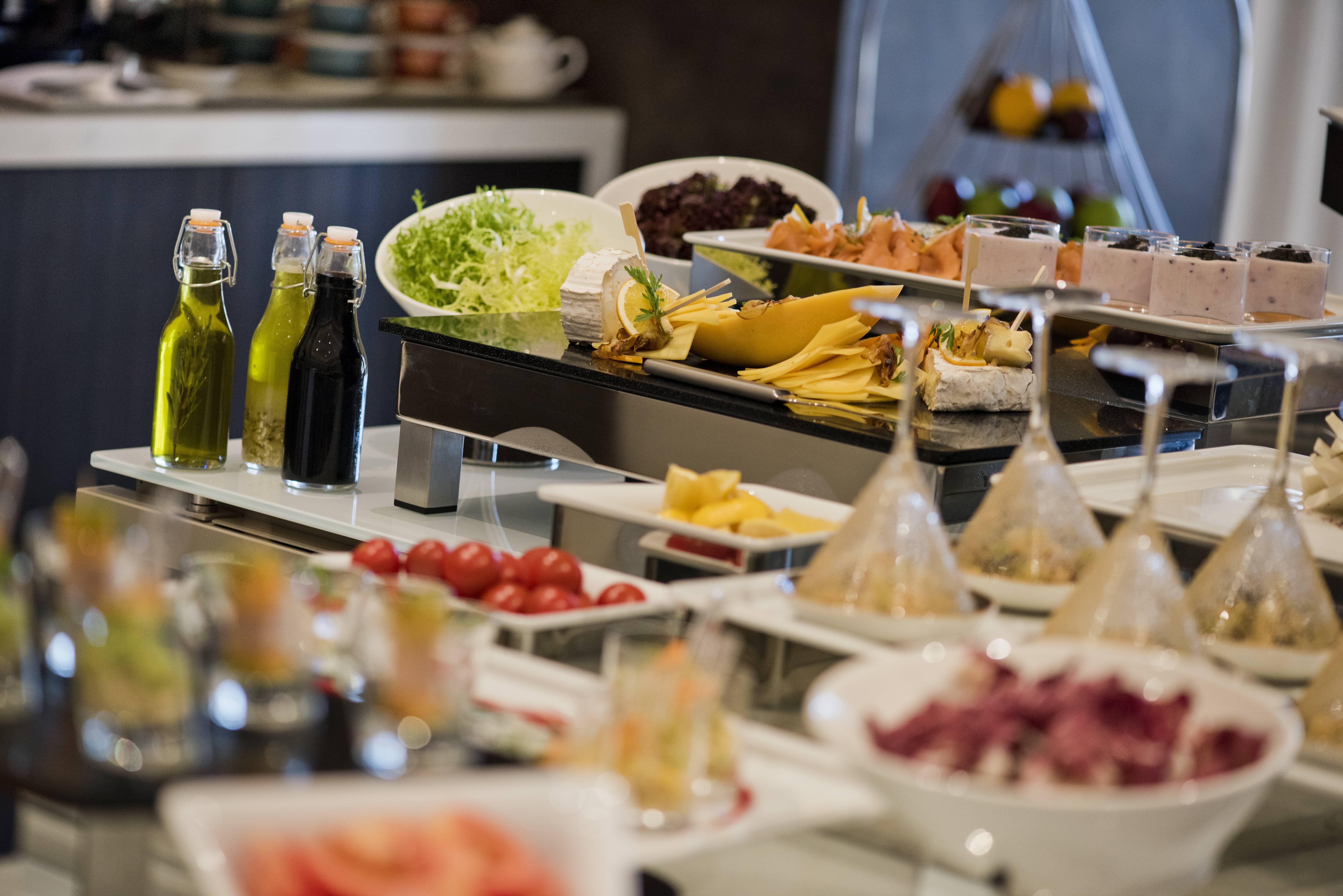 Voco Doha West Bay Suites By Ihg Exterior photo A salad bar