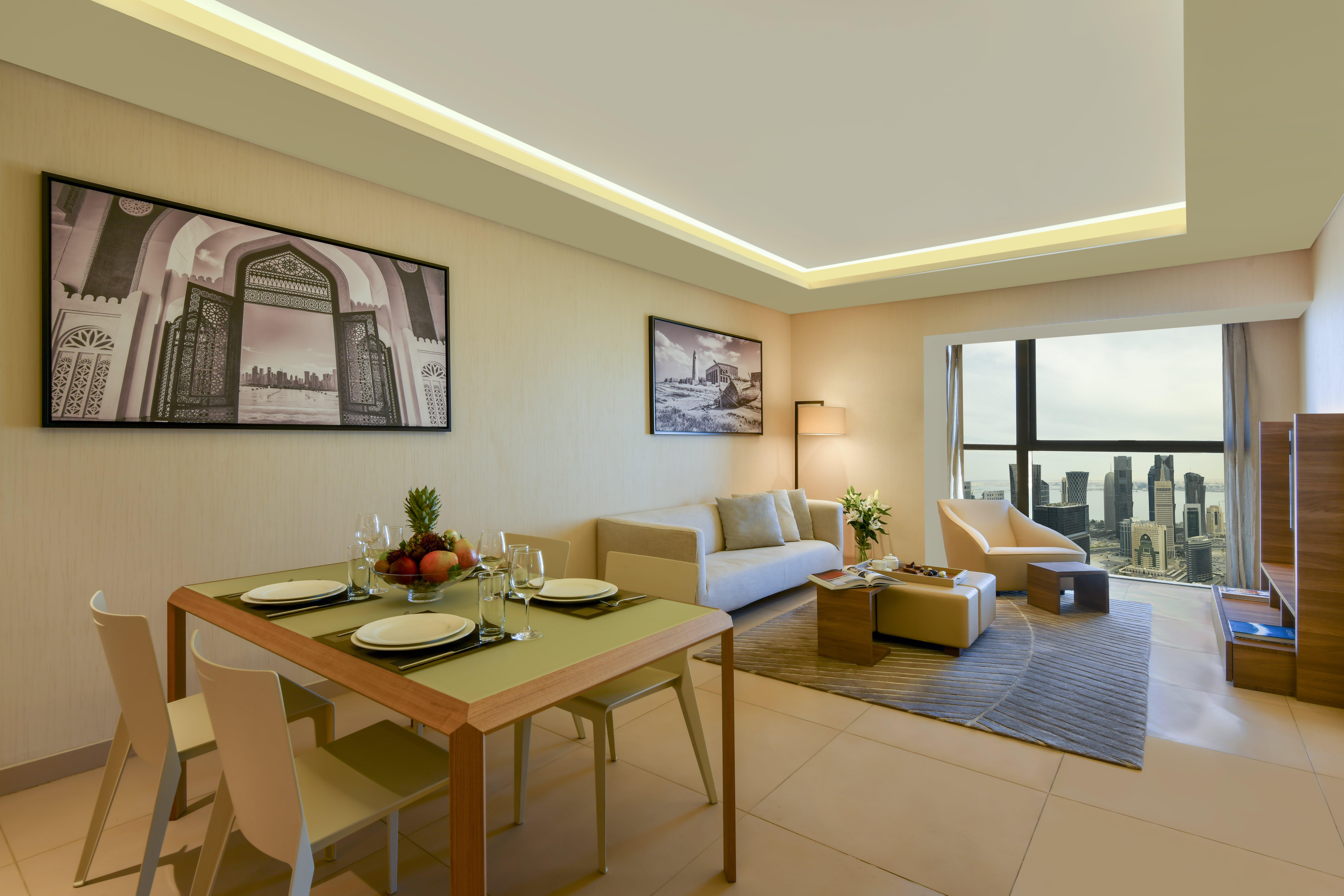 Voco Doha West Bay Suites By Ihg Exterior photo A typical apartment interior
