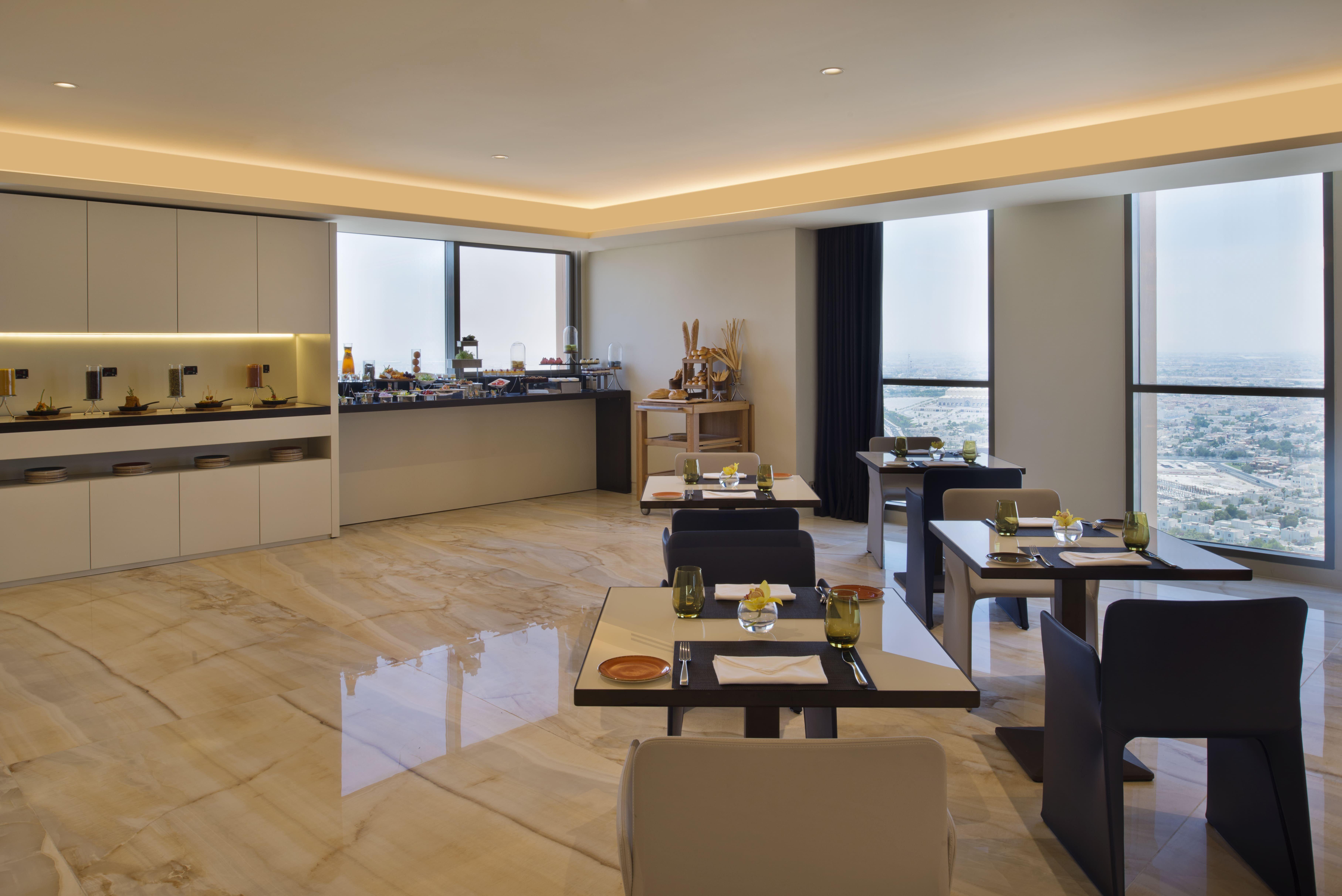 Voco Doha West Bay Suites By Ihg Exterior photo The Kitchen