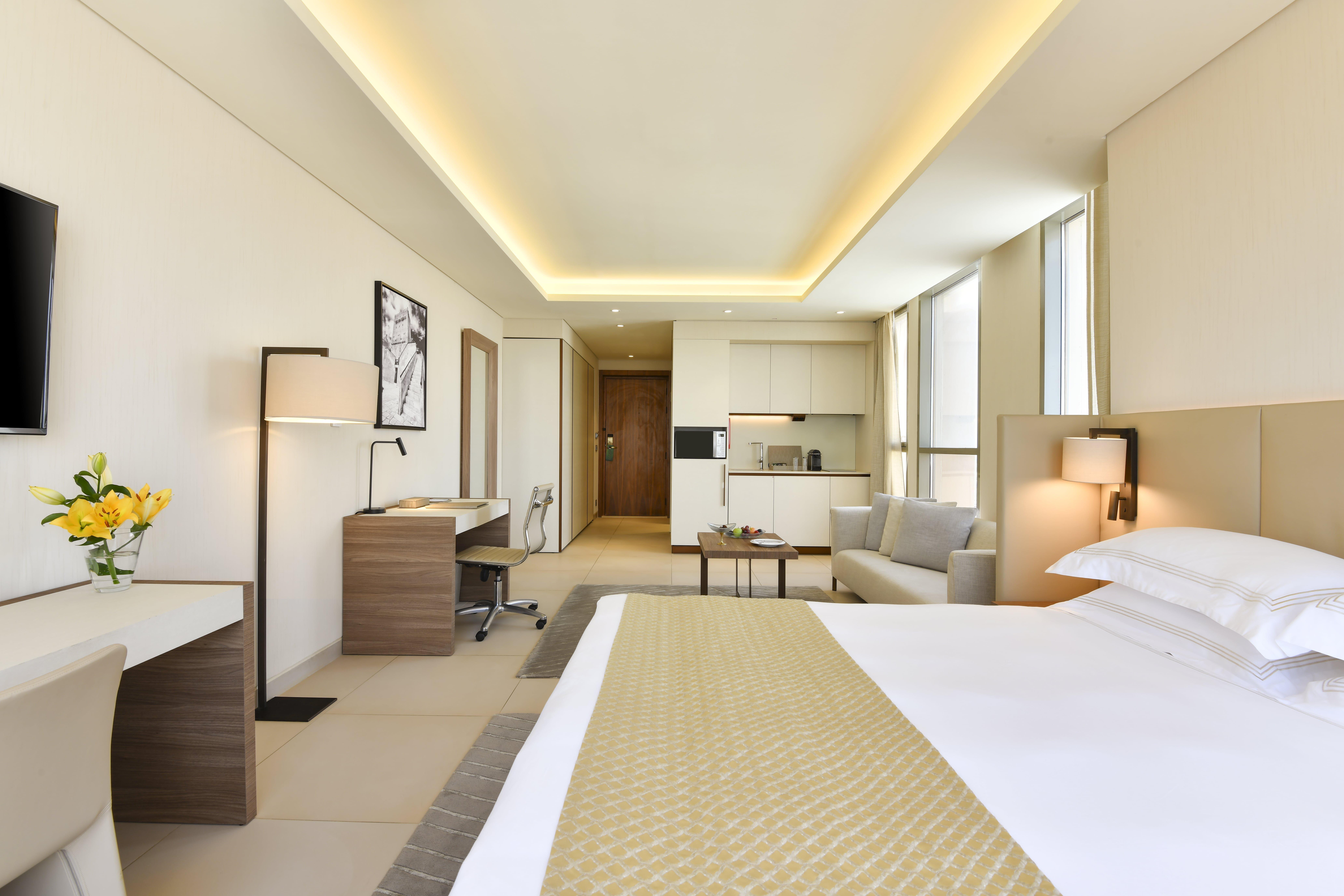 Voco Doha West Bay Suites By Ihg Exterior photo A typical room at the hotel