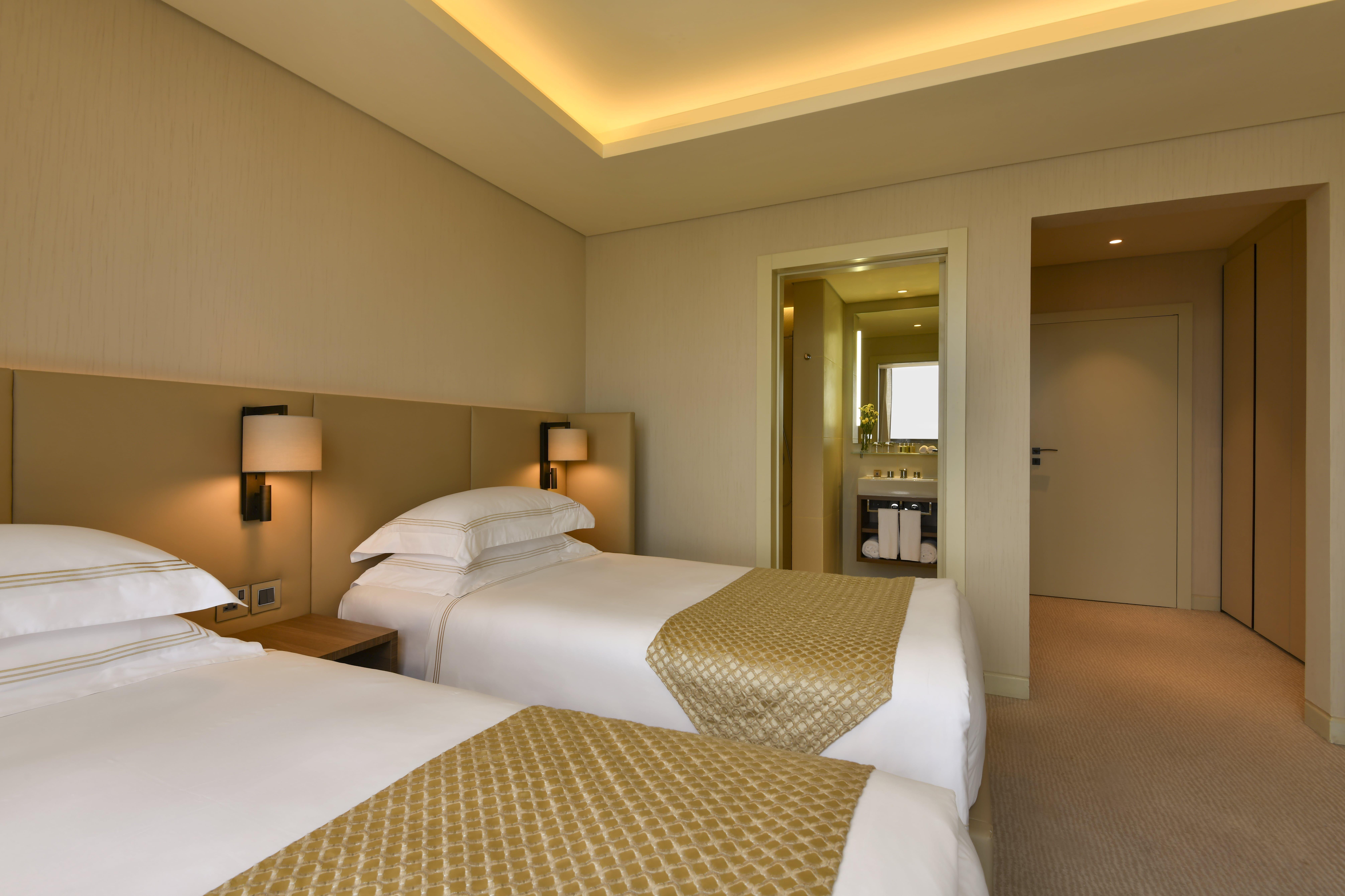 Voco Doha West Bay Suites By Ihg Exterior photo Deluxe Room