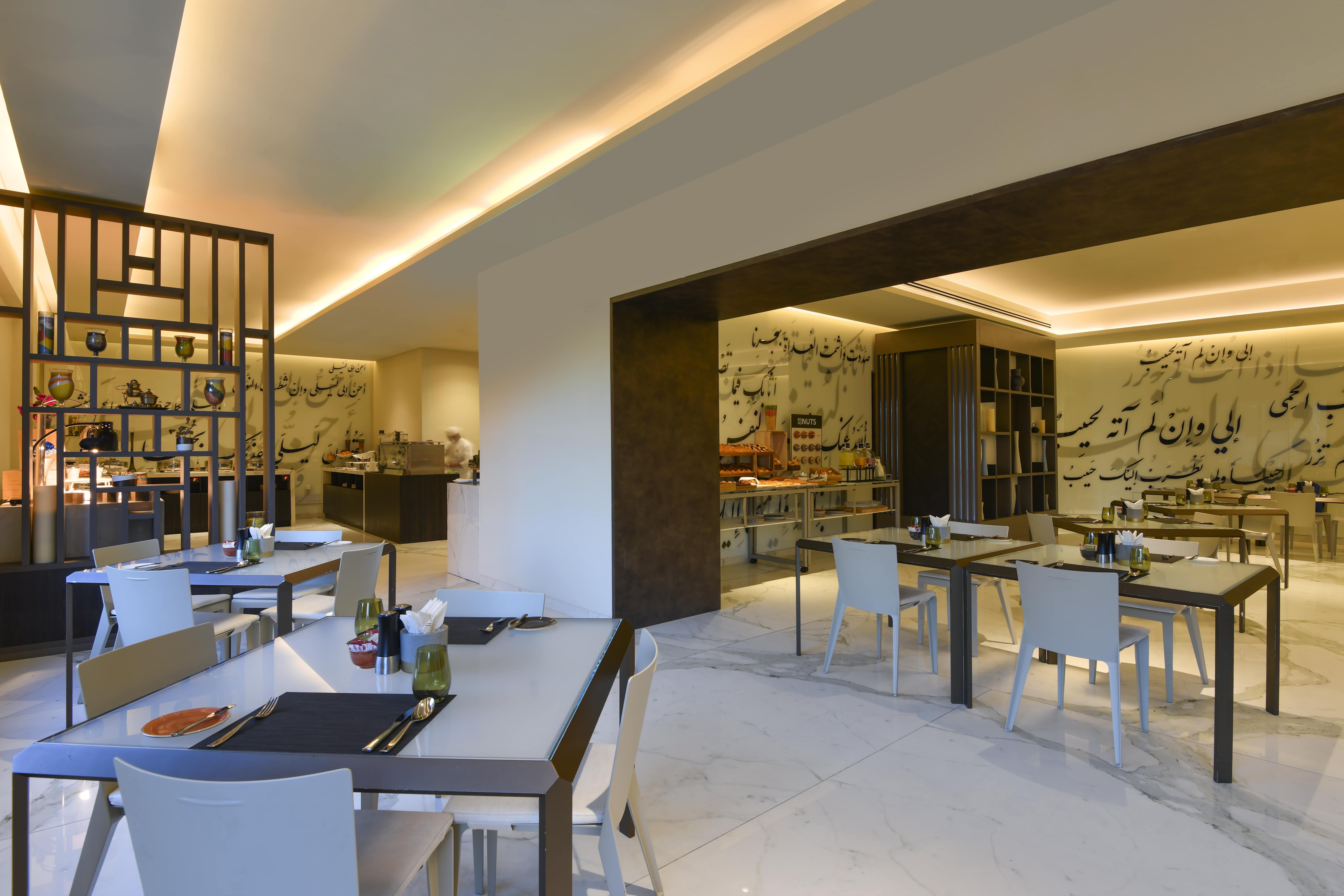 Voco Doha West Bay Suites By Ihg Exterior photo The restaurant