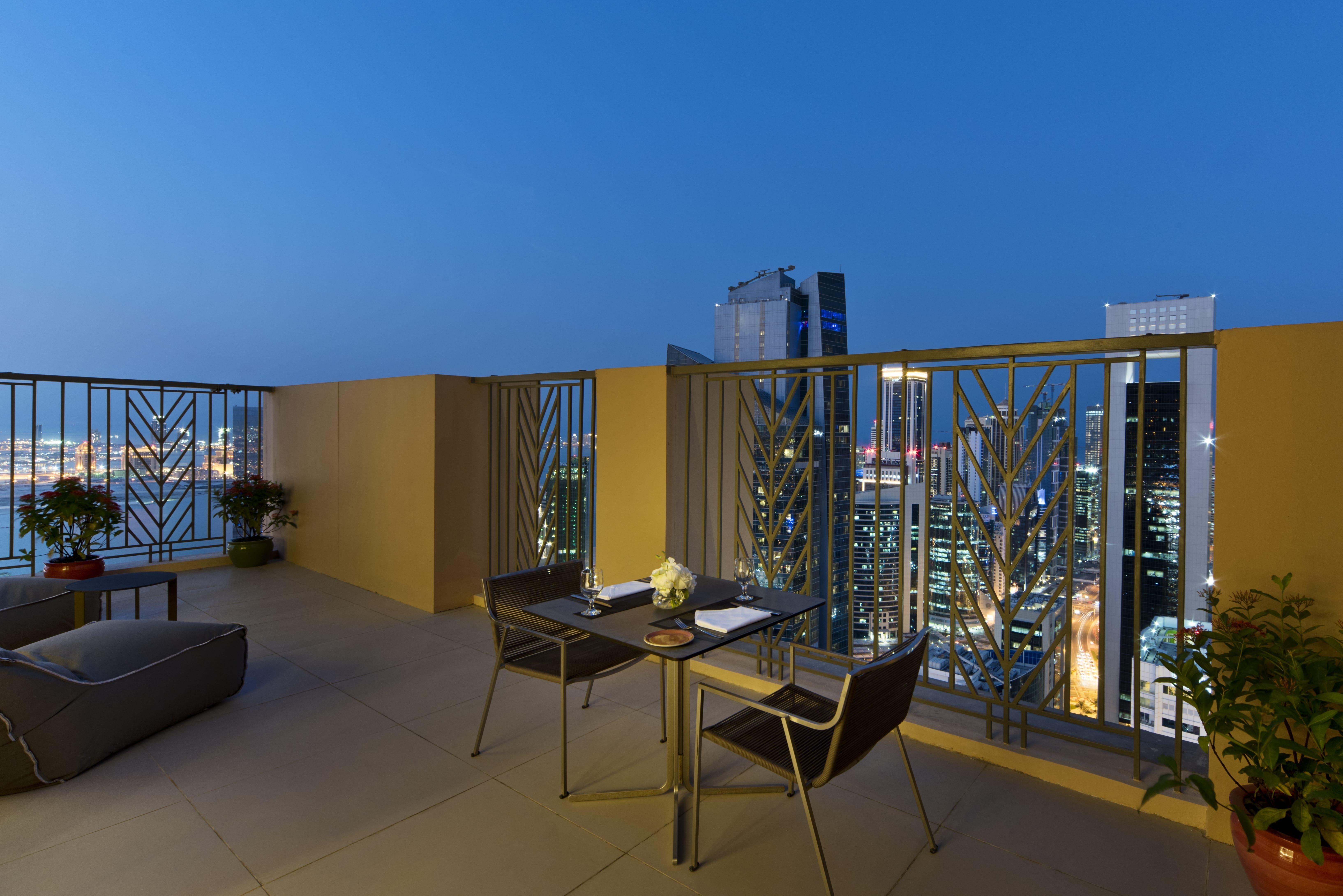 Voco Doha West Bay Suites By Ihg Exterior photo A balcony